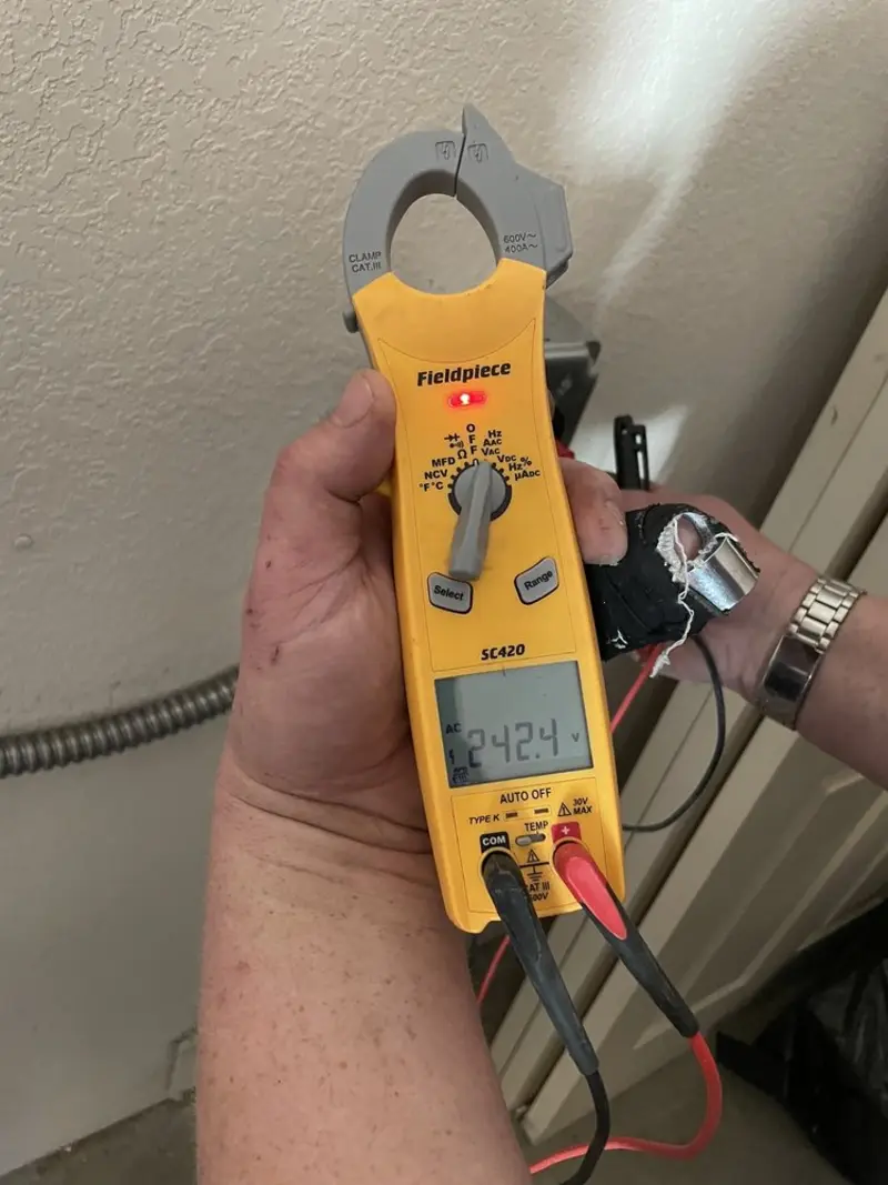Voltage testing with clamp meter during Generator Installation in Burtchville